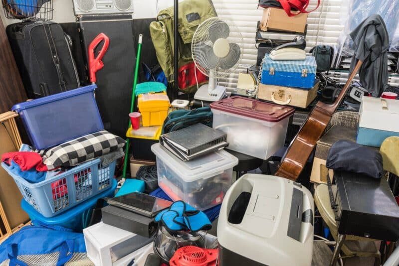 house full of junk that is piling on top of everything in desperate need of junk removal services