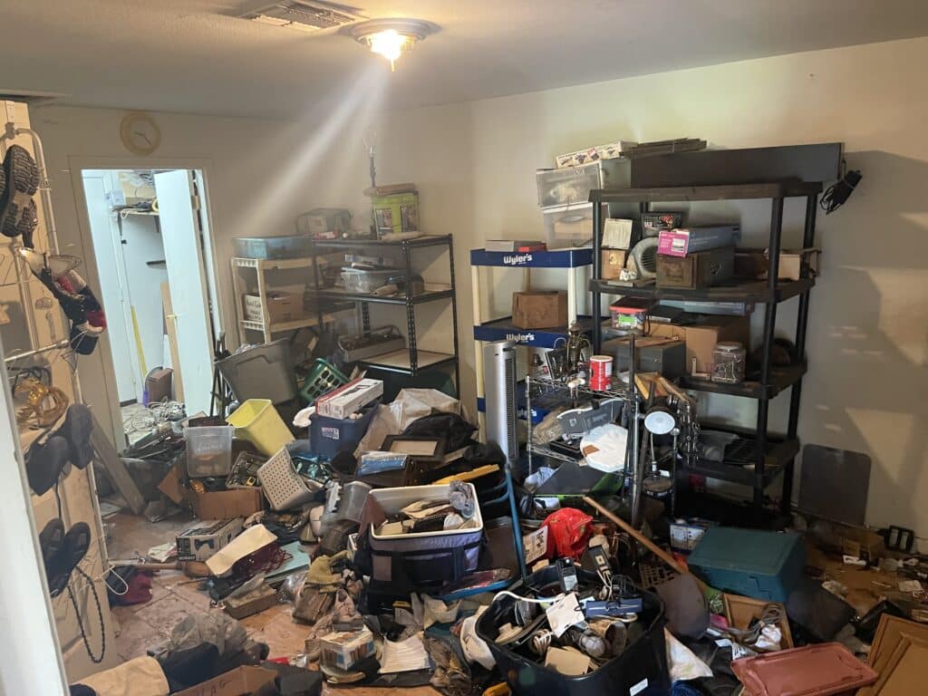 house full of junk that is falling off of shelves in need of junk removal services