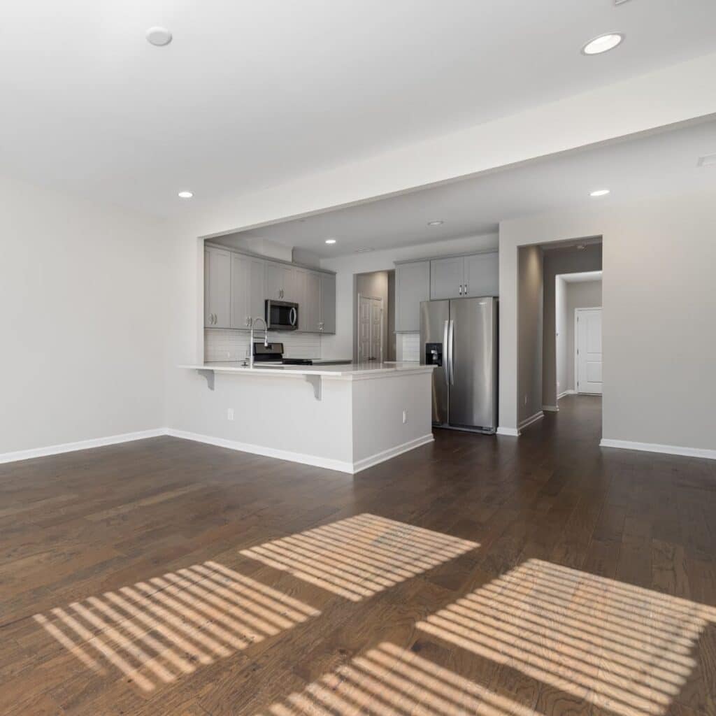 wide shot of an empty apartment that has been cleaned out